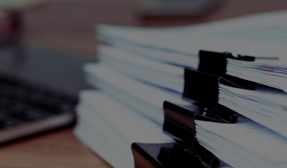 Close-up of stacks of business documents