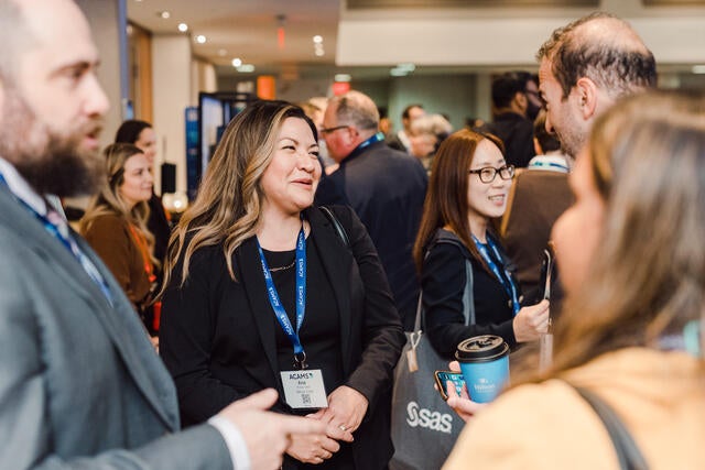 Canada Conference Recap Photo - Close up of a few attendees networking