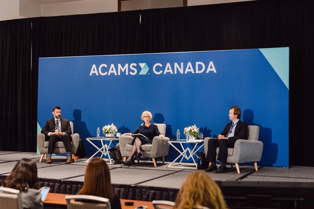 Canada Conference Recap Photo - Three panel speakers discussing a topic