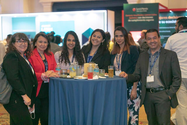 LATAM Conference Recap Photo - Six attendees at their table