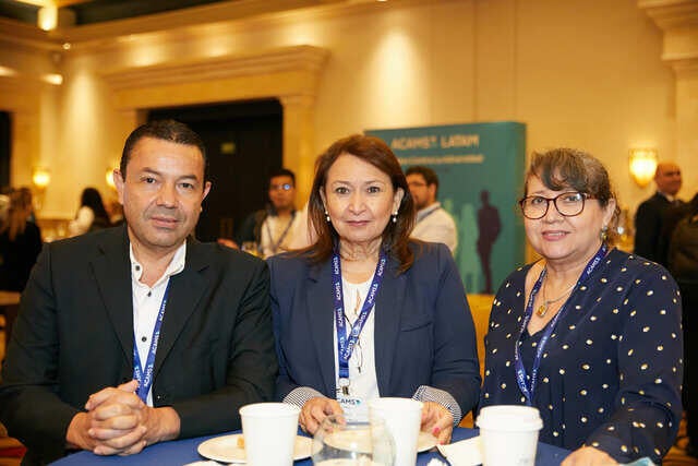 LATAM Conference Recap Photo - Three attendees at their table