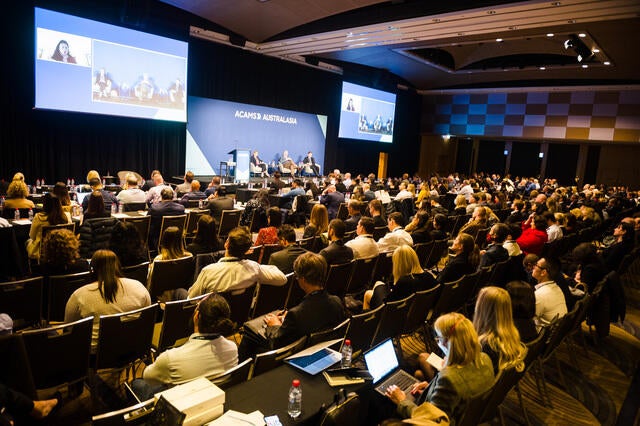 Australasia Conference Recap - Three speaker panel with view of audience