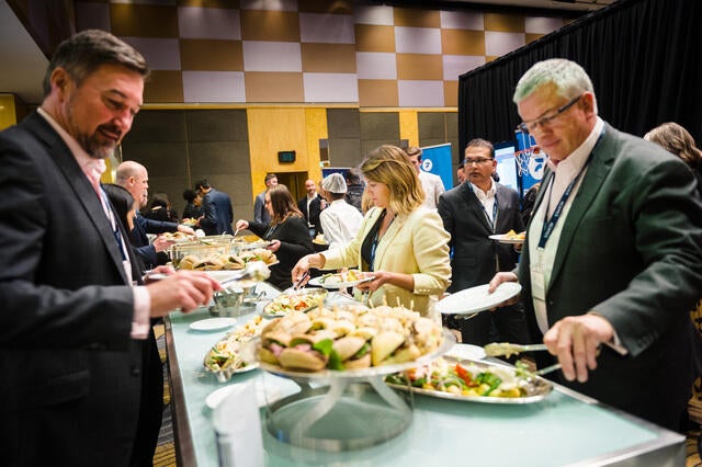 Australasia Conference Recap - Attendees plating their food