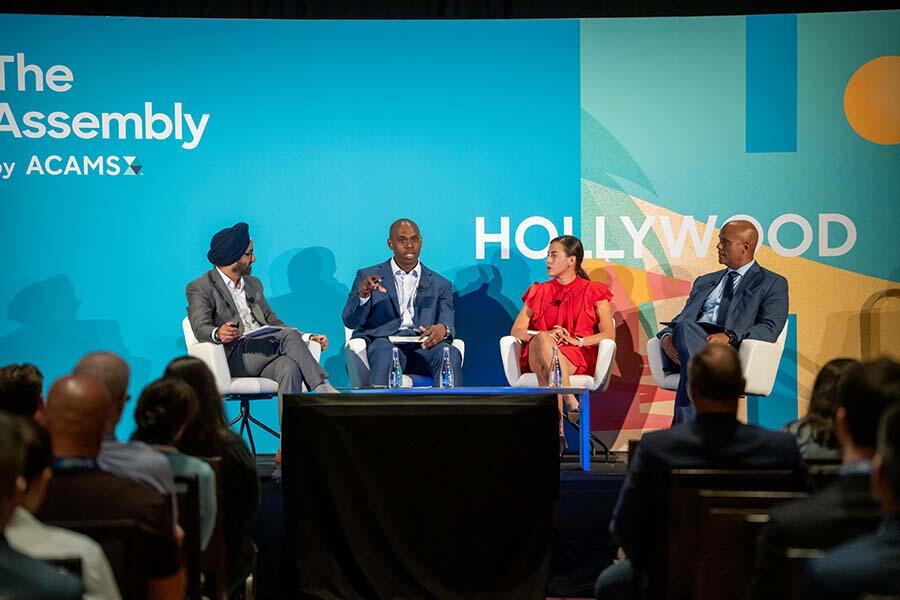Four experts engaging in discussion at ACAMS Hollywood