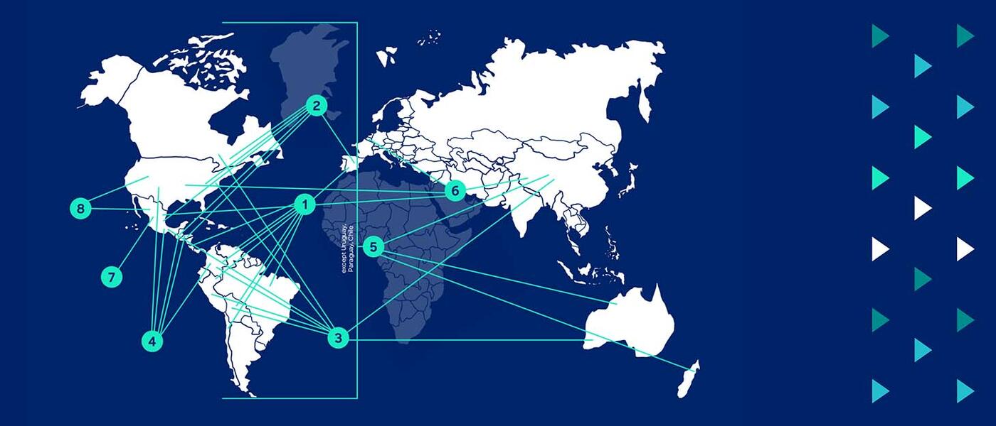 World map featuring blue lines connecting green dots, illustrating global locations or routes.